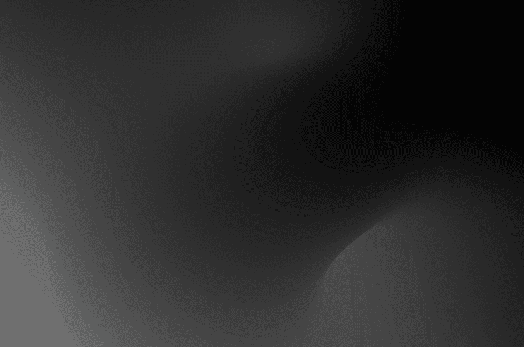Abstract gradient design featuring smooth transitions from dark gray to black.